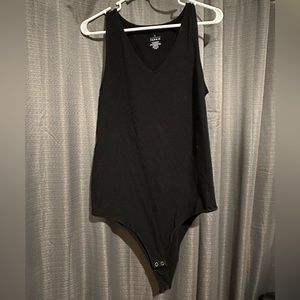 Torrid size 2 black tank top bodysuit. Never worn.